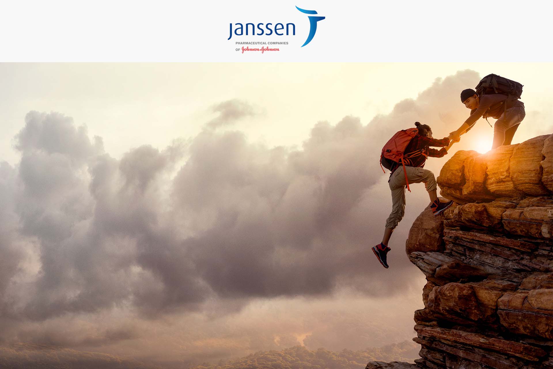 Janssen logo and picture of people helping each other up a cliff