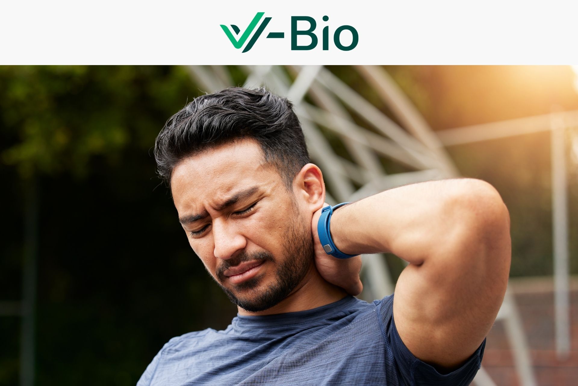 Man clutching his neck in pain