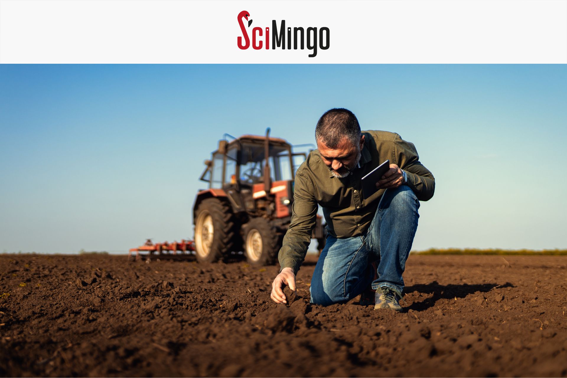 Farmer looking at soil